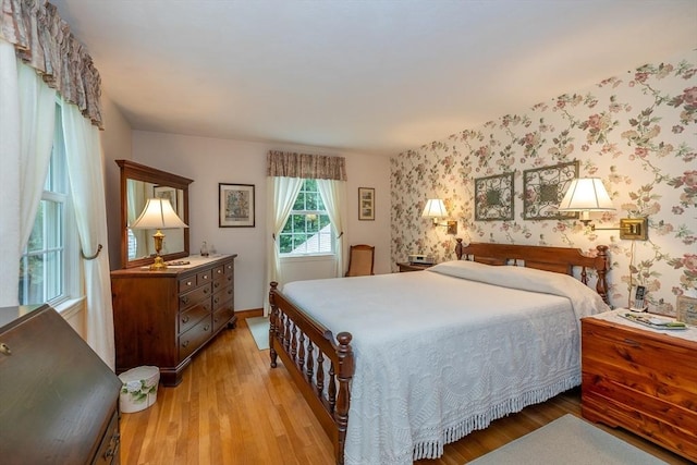 21 Overlook Dr, Chelmsford, MA 01824 - bedroom with wallpapered walls and wood finished floors