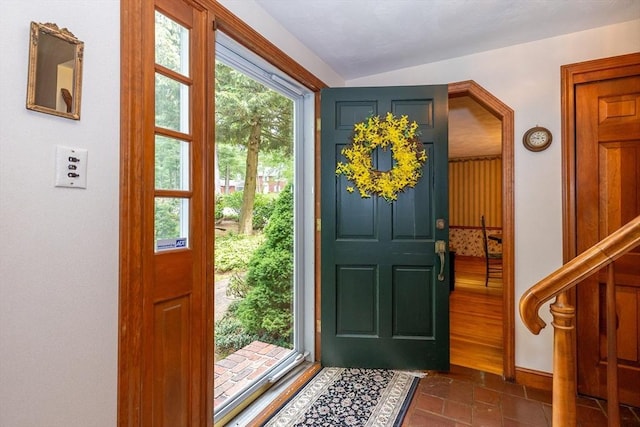 21 Overlook Dr, Chelmsford, MA 01824 - entryway featuring dark tile patterned flooring and arched walkways