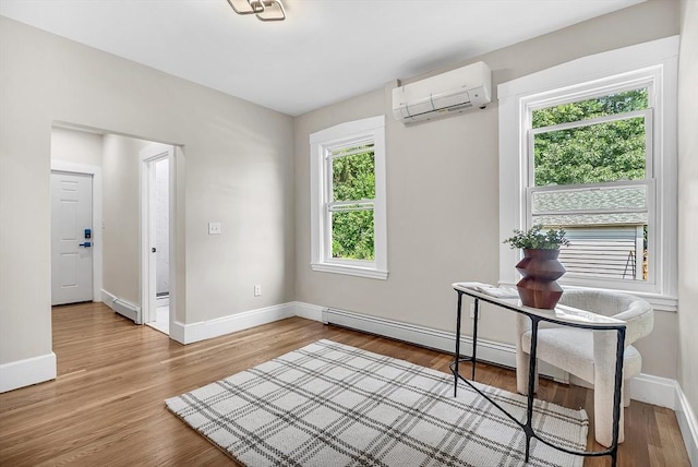 30 Forest Park Rd, Woburn, MA 01801 - interior space with an AC wall unit and wood finished floors