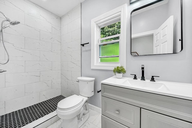 30 Forest Park Rd, Woburn, MA 01801 - bathroom featuring marble look tiles, vanity, and tiled shower