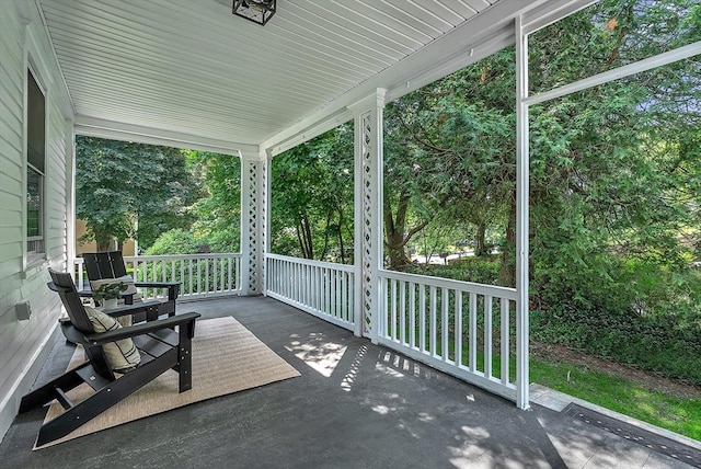 30 Forest Park Rd, Woburn, MA 01801 - covered porch featuring view of wooded area