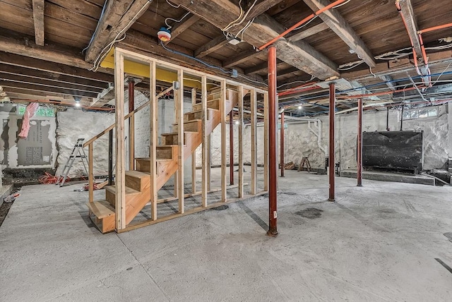 30 Forest Park Rd, Woburn, MA 01801 - unfinished basement featuring oil tank and stairway