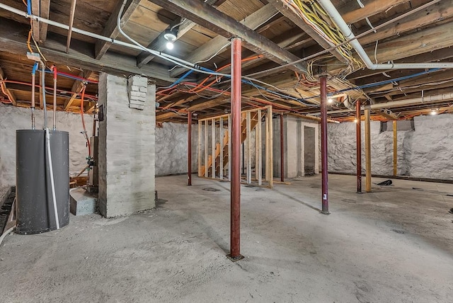 30 Forest Park Rd, Woburn, MA 01801 - unfinished below grade area with water heater and stairs