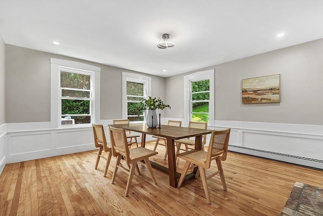 30 Forest Park Rd, Woburn, MA 01801 - dining space featuring light wood-type flooring, a wainscoted wall, baseboard heating, a decorative wall, and recessed lighting