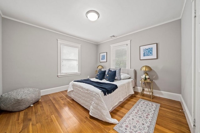 324 Mount Auburn St Unit 2, Watertown, MA 02472 - bedroom featuring ornamental molding and wood finished floors