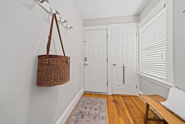 324 Mount Auburn St Unit 2, Watertown, MA 02472 - entryway with light wood-style flooring and baseboards