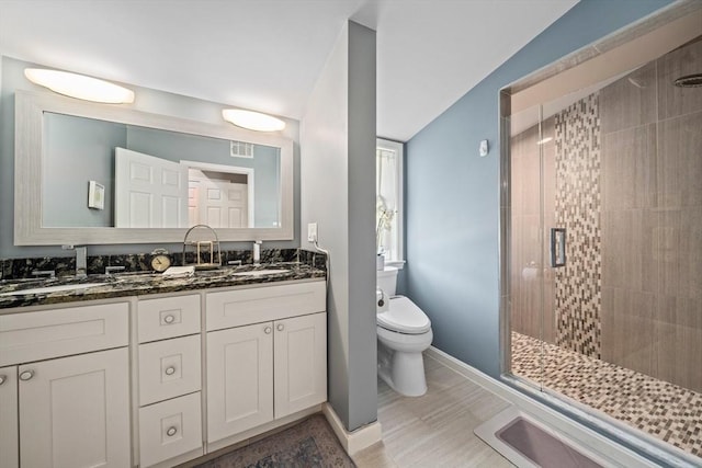 324 Mount Auburn St Unit 2, Watertown, MA 02472 - bathroom with a stall shower and double vanity