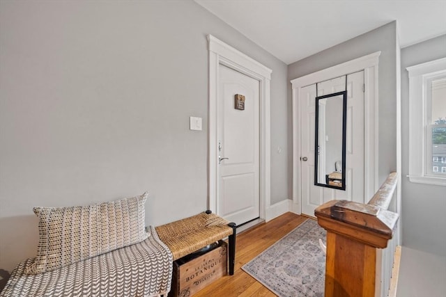 324 Mount Auburn St Unit 2, Watertown, MA 02472 - foyer featuring wood finished floors and baseboards
