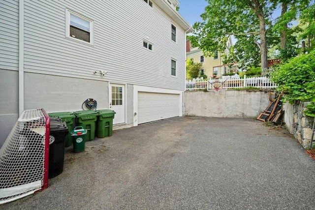324 Mount Auburn St Unit 2, Watertown, MA 02472 - view of side of property with an attached garage and driveway