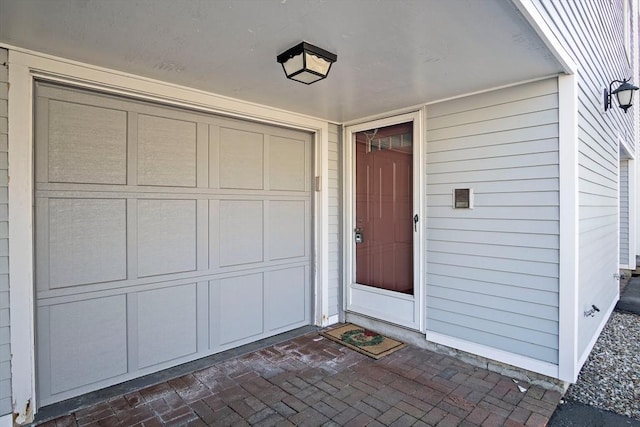 property entrance featuring a garage