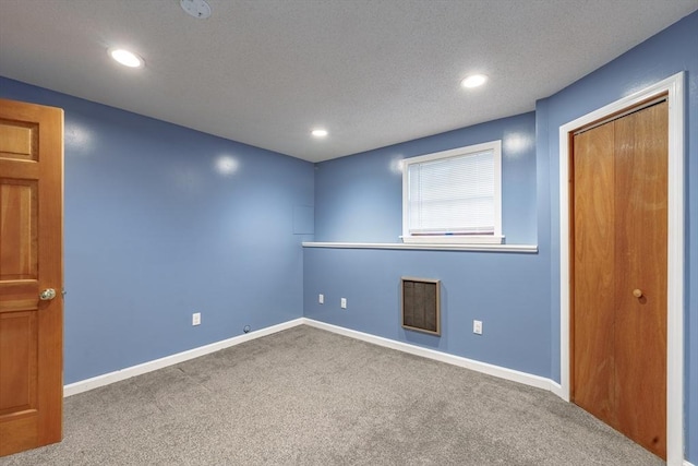 unfurnished room with carpet floors