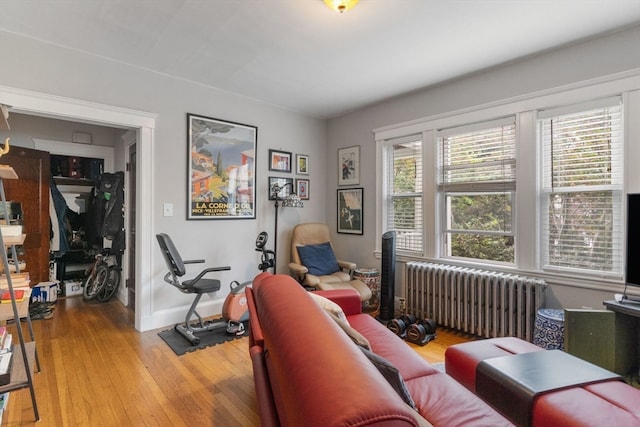 interior space with radiator and light hardwood / wood-style floors