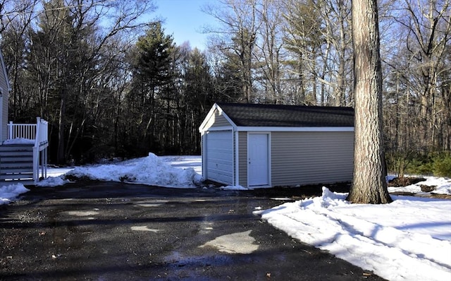 exterior space featuring a detached garage