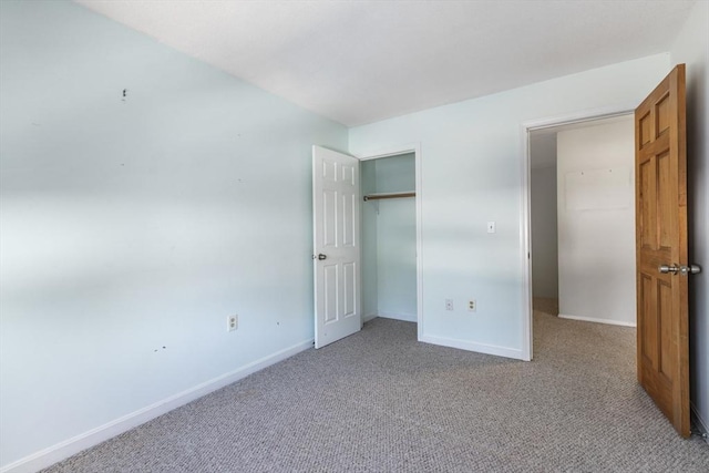 unfurnished bedroom with light colored carpet