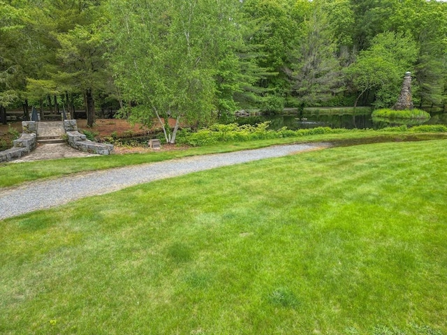 44 Bay Farm Rd Unit 44, Duxbury, MA 02332 - view of grassy yard featuring a water view and a view of trees