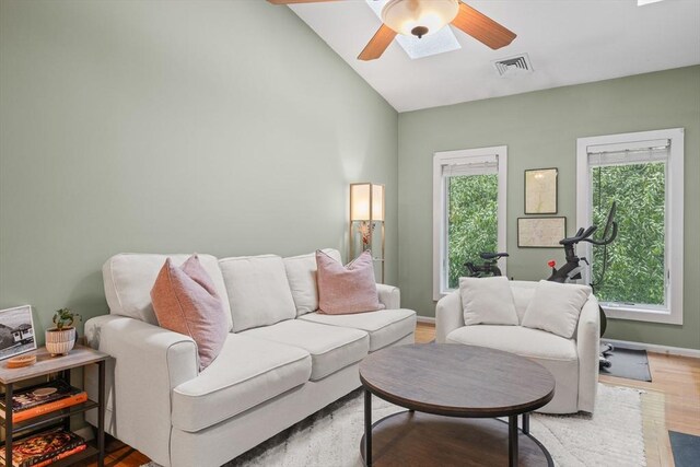 44 Bay Farm Rd Unit 44, Duxbury, MA 02332 - living room featuring a ceiling fan, light wood-style floors, and vaulted ceiling