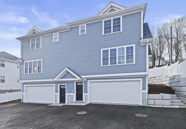 view of front of property featuring a garage