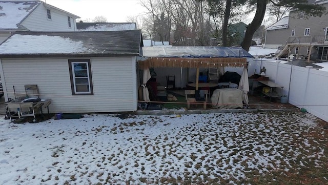 view of snow covered property