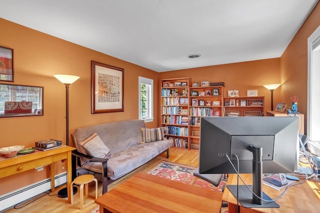 12 Old Meadow Rd, Dover, MA 02030 - office space with a baseboard radiator and wood finished floors