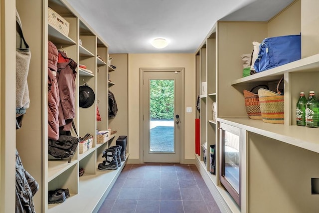 12 Old Meadow Rd, Dover, MA 02030 - mudroom featuring baseboards and dark tile patterned flooring