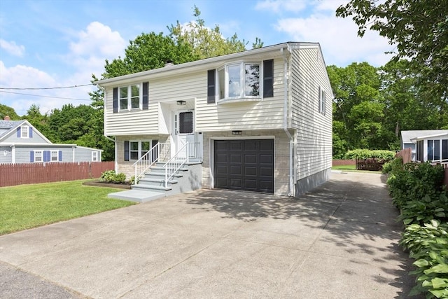 24 Roosevelt St, Taunton, MA 02780 - raised ranch with an attached garage and concrete driveway