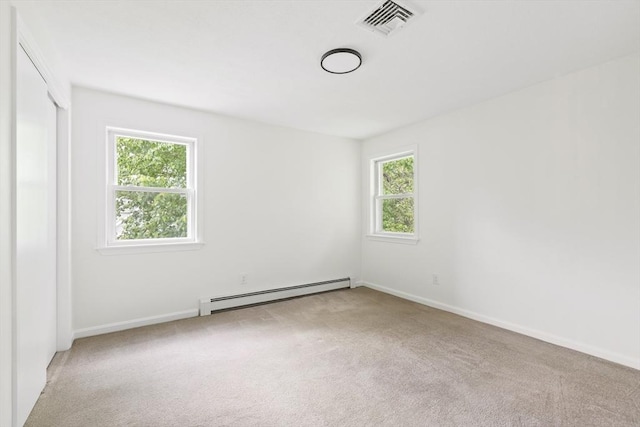 24 Roosevelt St, Taunton, MA 02780 - unfurnished room with a baseboard radiator, plenty of natural light, carpet, and baseboards