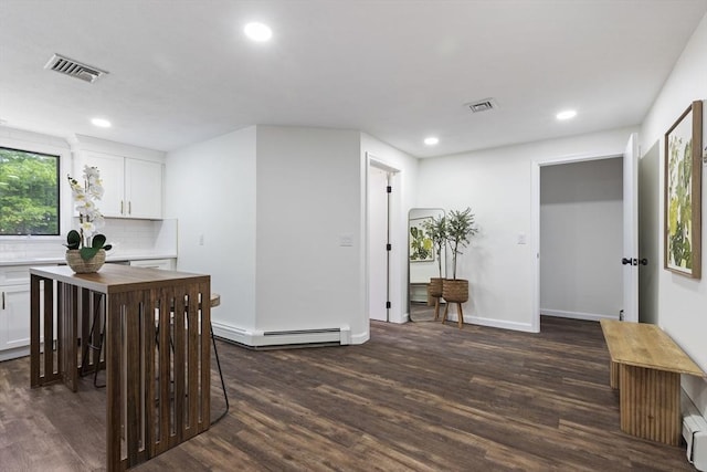 24 Roosevelt St, Taunton, MA 02780 - home office featuring a baseboard radiator, dark wood-style floors, recessed lighting, baseboards, and baseboard heating