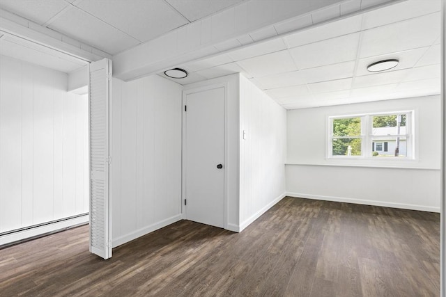 24 Roosevelt St, Taunton, MA 02780 - basement featuring wood finished floors, baseboards, and a baseboard heating unit