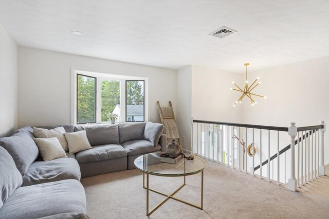 24 Roosevelt St, Taunton, MA 02780 - living room with a chandelier and carpet floors