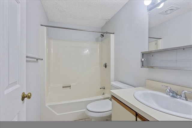 30 Revere Beach Pkwy Unit 207, Medford, MA 02155 - bathroom featuring a textured ceiling, vanity, toilet, and shower / tub combination