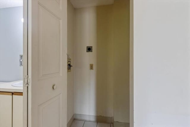 30 Revere Beach Pkwy Unit 207, Medford, MA 02155 - hall featuring light tile patterned floors and baseboards