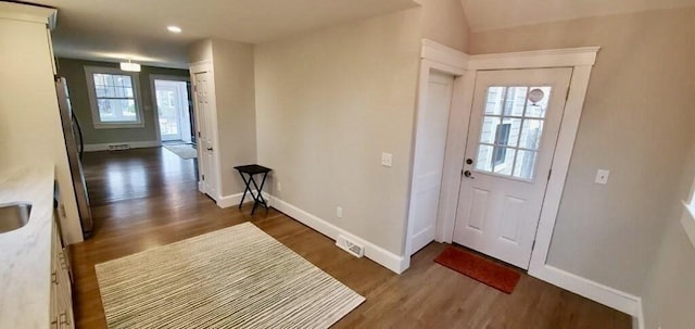 60 Grove St, Barnstable, MA 02601 - entryway featuring wood finished floors, baseboards, and recessed lighting