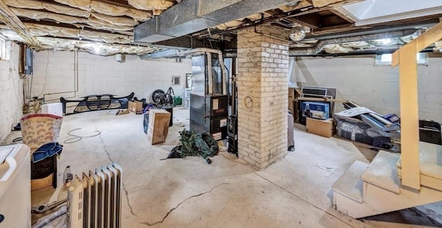 60 Grove St, Barnstable, MA 02601 - unfinished below grade area with radiator and heating unit