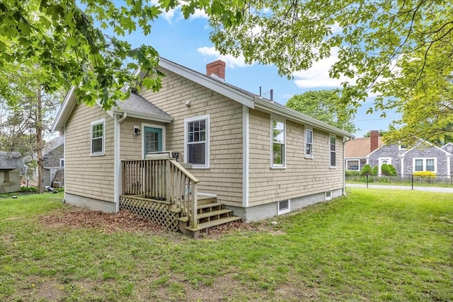60 Grove St, Barnstable, MA 02601 - back of house featuring a chimney