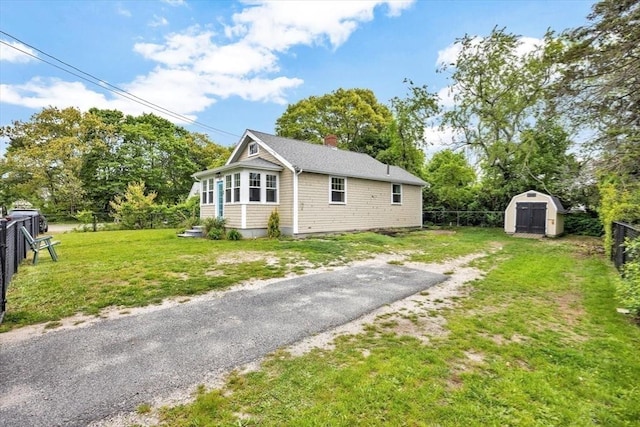 60 Grove St, Barnstable, MA 02601 - view of side of home with a chimney