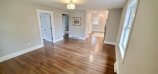 60 Grove St, Barnstable, MA 02601 - empty room with wood finished floors and baseboards