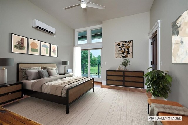 58 Main St Unit 4, Hatfield, MA 01038 - bedroom with a wall unit AC, wood finished floors, and a ceiling fan