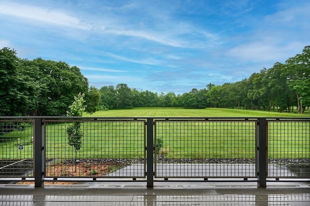 58 Main St Unit 4, Hatfield, MA 01038 - gate with view of wooded area and a lawn