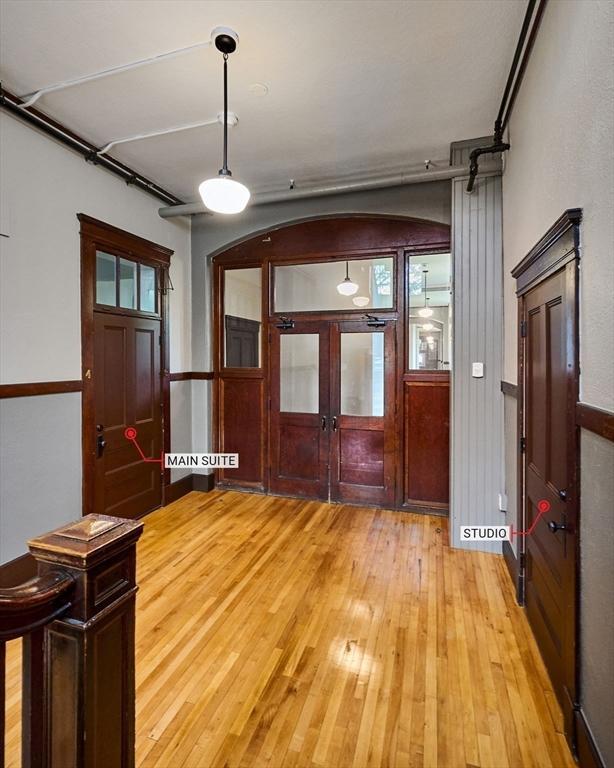 58 Main St Unit 4, Hatfield, MA 01038 - foyer entrance with light wood-style floors