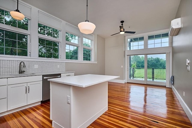 58 Main St Unit 4, Hatfield, MA 01038 - kitchen with ceiling fan, plenty of natural light, light wood-style flooring, and dishwasher