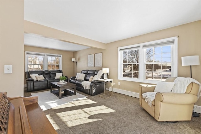 carpeted living room featuring beam ceiling