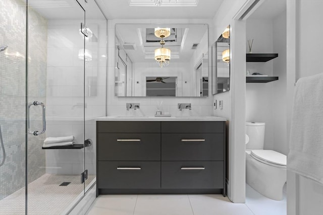 full bath featuring toilet, a shower stall, tile patterned floors, and double vanity