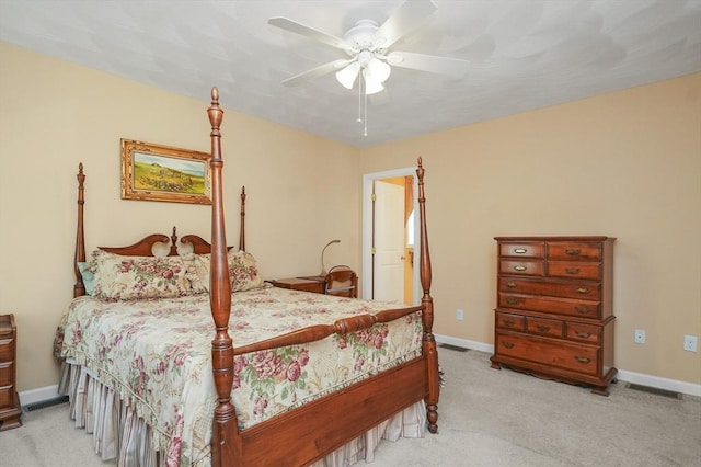 bedroom with baseboards, a ceiling fan, carpet flooring, and visible vents
