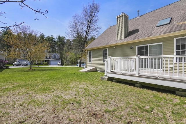 view of yard featuring a deck