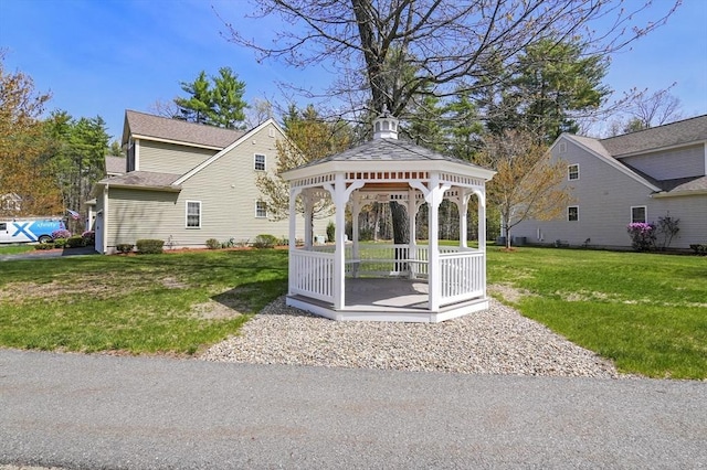 view of home's community featuring a gazebo and a yard