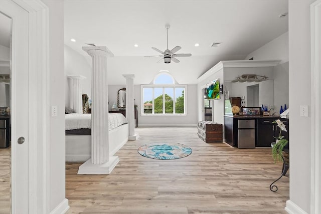 75 Narrows Rd, Freetown, MA 02702 - bedroom with wood finished floors, lofted ceiling, ornate columns, refrigerator, and baseboards