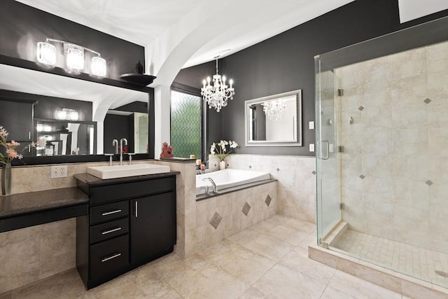 75 Narrows Rd, Freetown, MA 02702 - full bath with a shower stall, a bath, a chandelier, tile patterned floors, and vanity