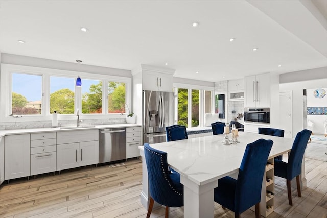 75 Narrows Rd, Freetown, MA 02702 - dining area featuring plenty of natural light, light wood finished floors, and recessed lighting