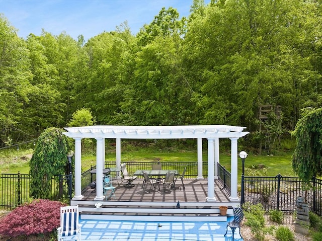 75 Narrows Rd, Freetown, MA 02702 - view of patio / terrace with outdoor dining space, a deck, and a wooded view