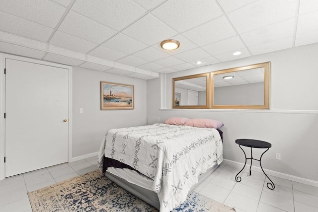 75 Narrows Rd, Freetown, MA 02702 - tiled bedroom featuring a paneled ceiling, baseboards, and recessed lighting